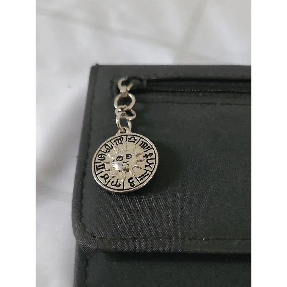 Womens Classic Black Wallet with Front Zip and Zodiac Charm
